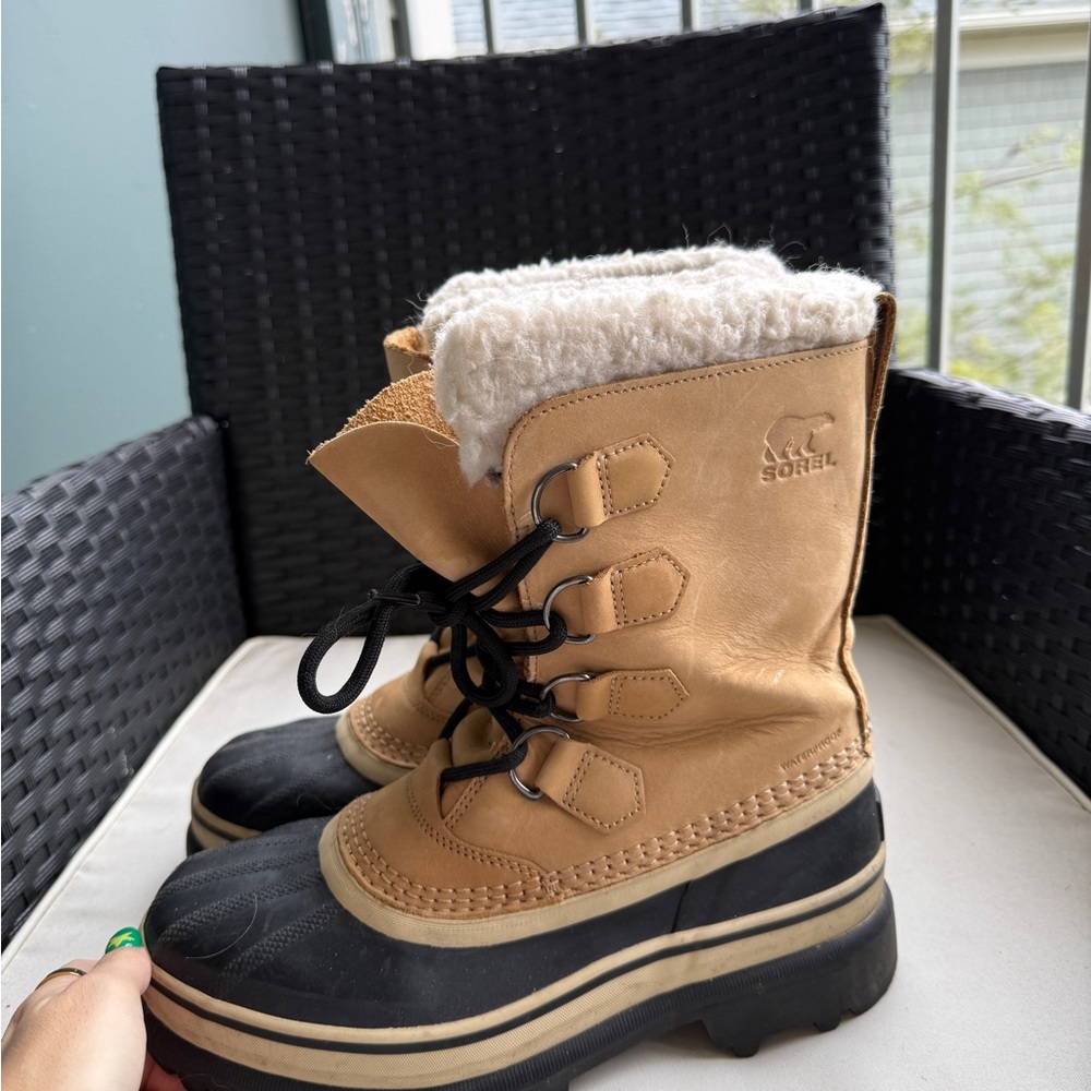 Sorel Tan and Black Winter Boots